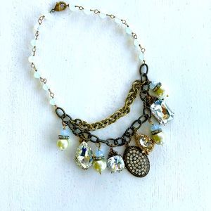 White crystal, pearl and charm necklace